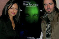 Pooja Kumar and Rick Pisarro in front of Seance Poster 